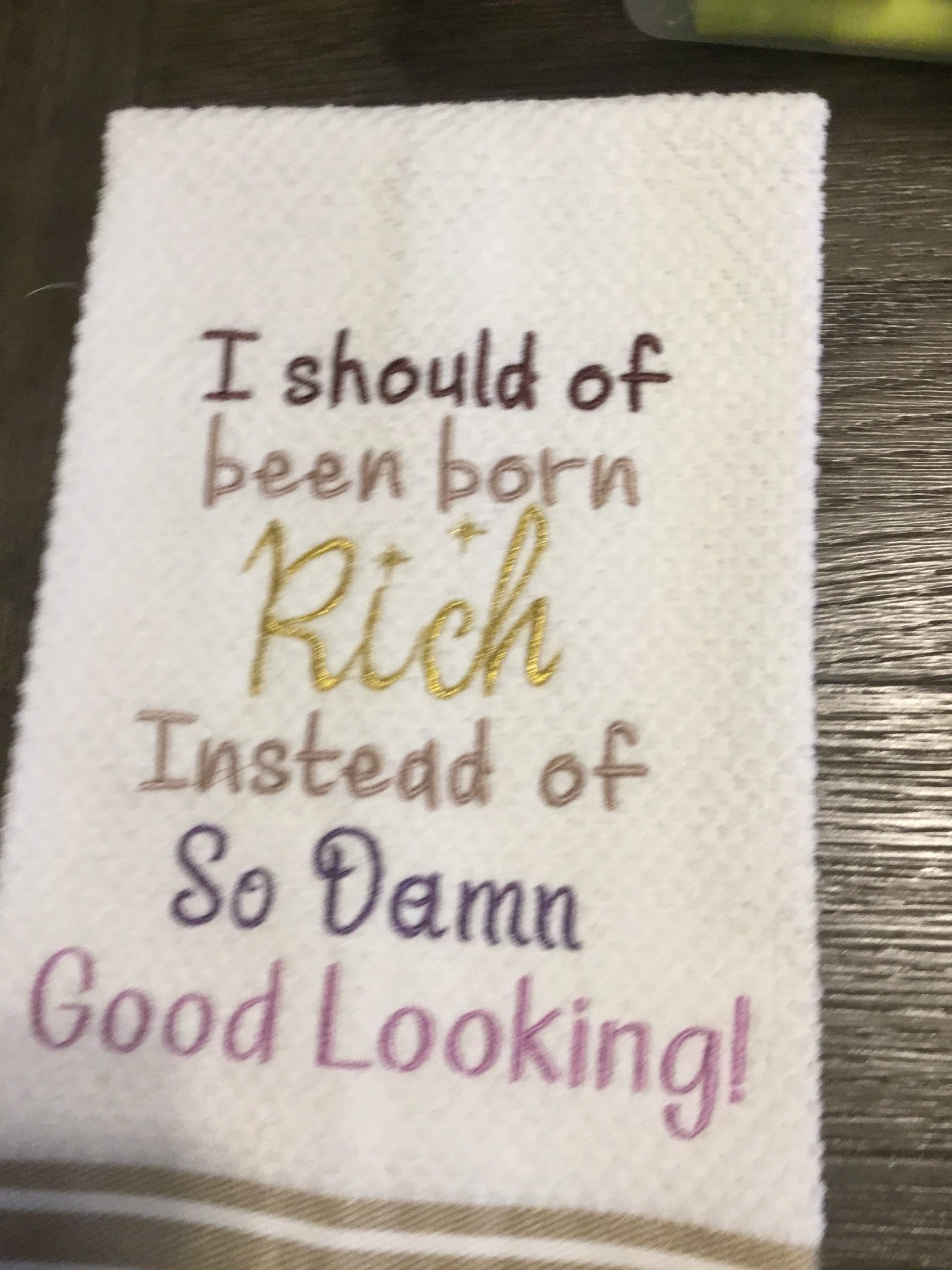 Sassy Saying embroidered on a terry towel.