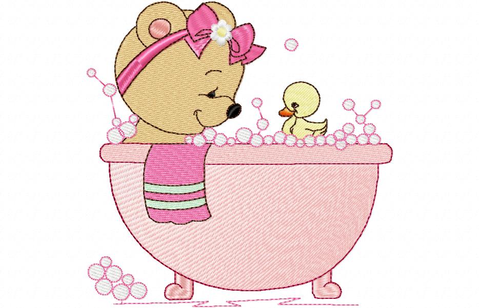 Baby bear taking a bath in a bathtub