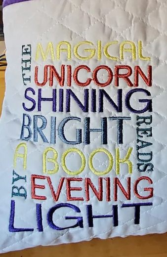 Unicorn Book Pillow saying embroidery design